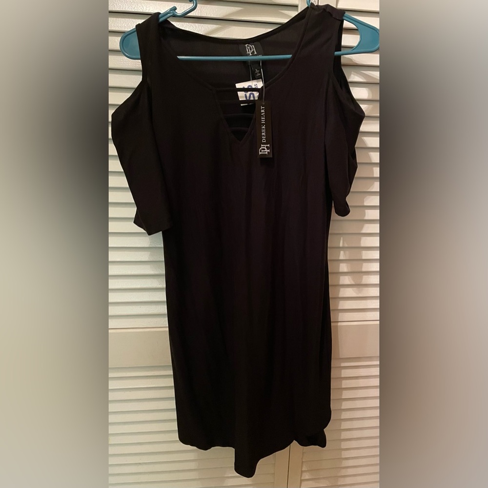 NWT. Women’s dress. Size L. Black.